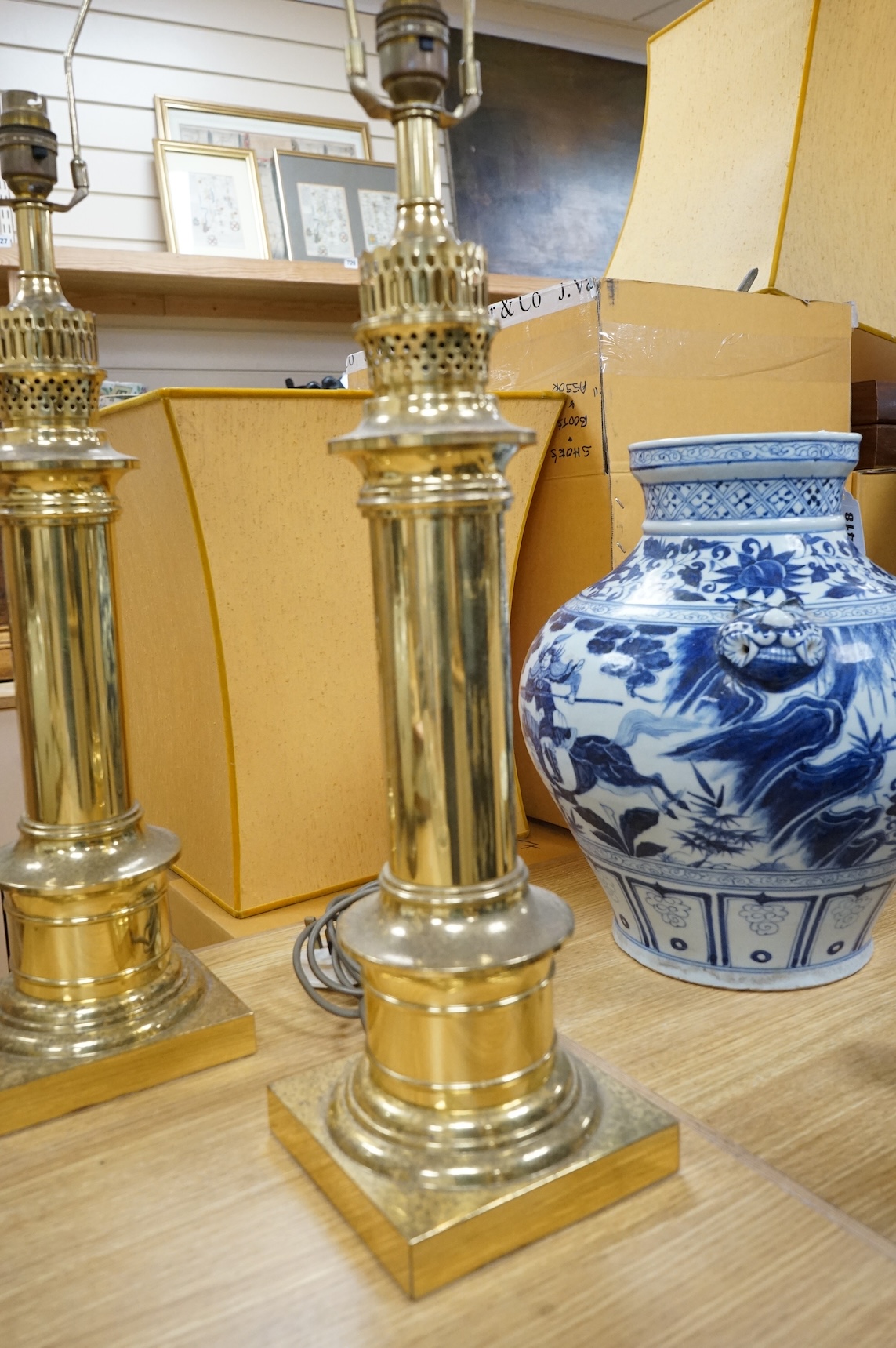 A pair of brass column table lamps, 51cm high excluding fitting